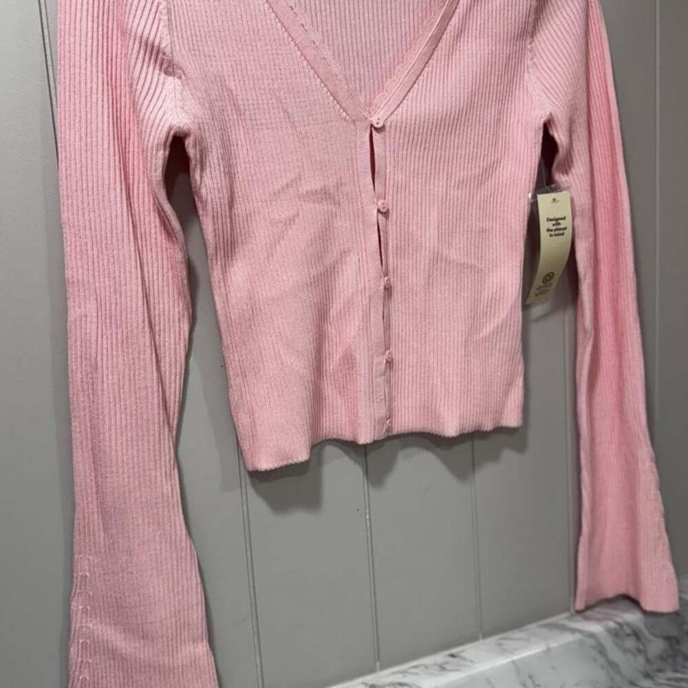 Pink ribbed knit cardigan with button detail